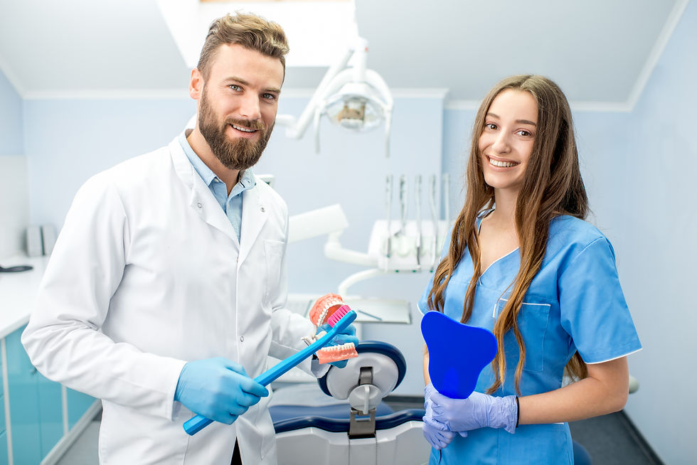 Dentist and Dental Assistant