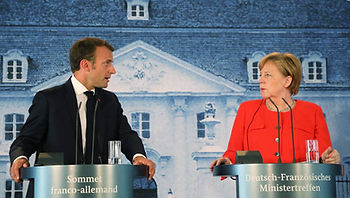 Emmanuel Macron et Angela Merkel durant leur conférence de presse mardi sur la réforme de l'Union européenne | LUDOVIC MARIN / AFP
