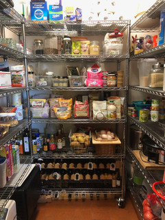 An image of a large pantry, neatly organized and clean.
