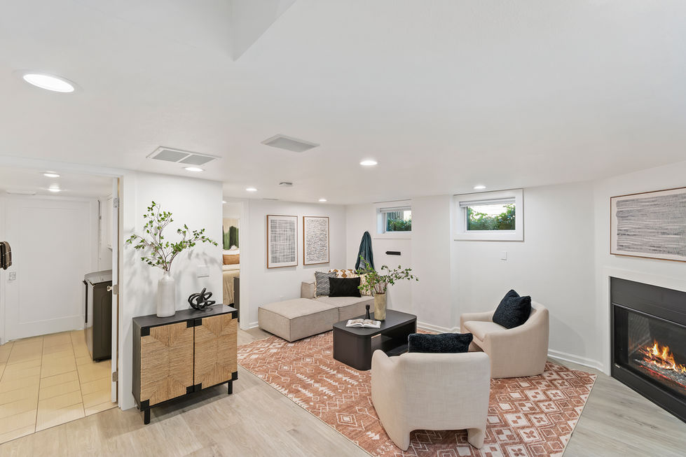 a living room with two chairs and a coffee table