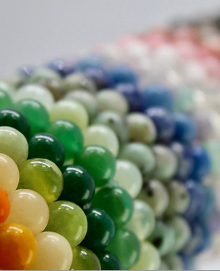 A selection of crystal gemstone bead bracelets