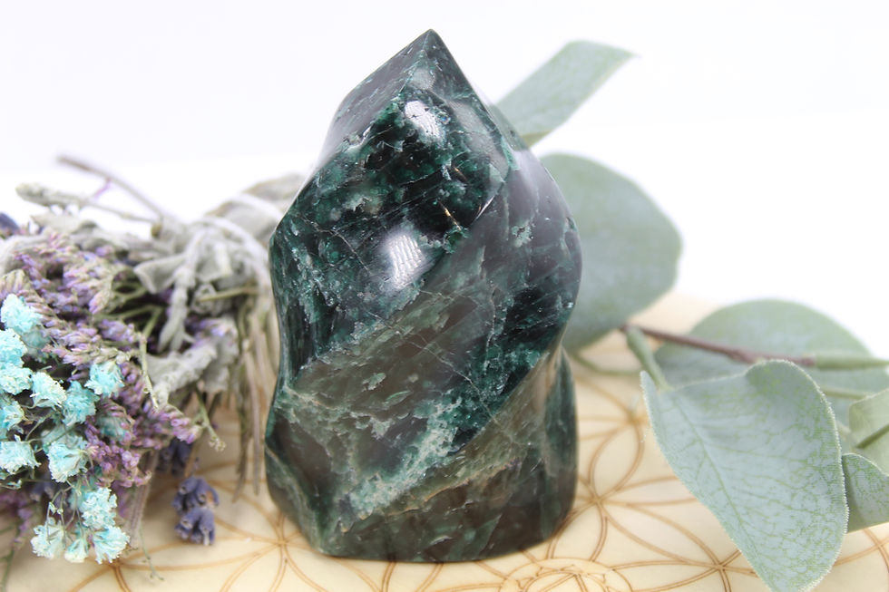 Blue apatite crystal polished flame carving