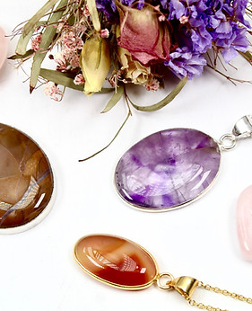 A selection of high quality crystal gemstone pendants 