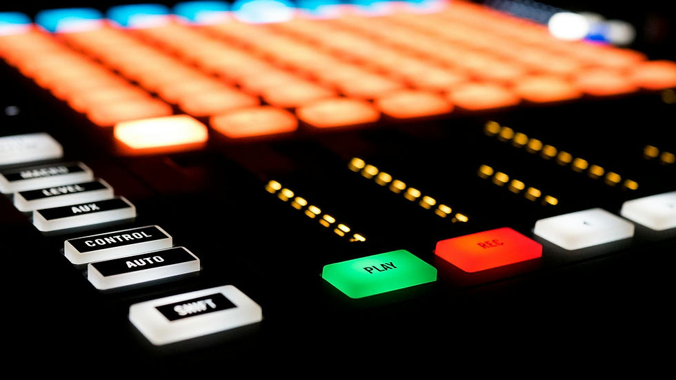 Detailed view of colorful buttons and controls on a professional DJ mixer.