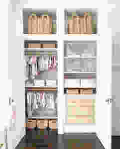 Light timber and white closet in kids room. Baskets at top. Pretty, clean aesthetic and textural. Organised closet.