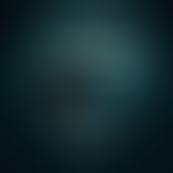 large iceberg in a calm, very dark ocean