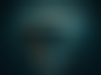 large iceberg in a calm, very dark ocean