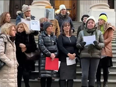 women speaking to news outlets, demanding change from chancellor banks