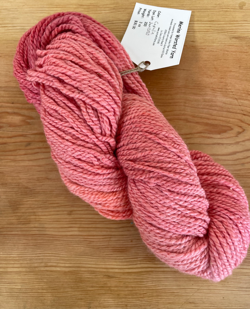 Thumbnail: pink merino worsted yarn skein
