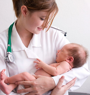 Doctor Holding Newborn