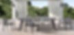 CAICOS DINING TABLE W NEW DINING ARM CHAIRS.jpeg