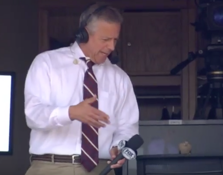 Thom Brenneman interviews real bird during Reds rally
