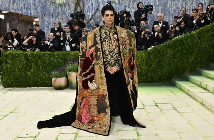 Karan Johar at Met Gala 2026 wearing custom Manish Malhotra Raja Ravi Varma inspired zardozi cape