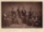 African American choir of men and women in formal clothes