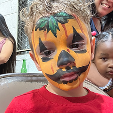 girls birthday party, boys birthday party, kids party, face painting servicekids birthday party, boy with pumpkin face paint, halloween face paint, pumpkin face, orange and green face paint