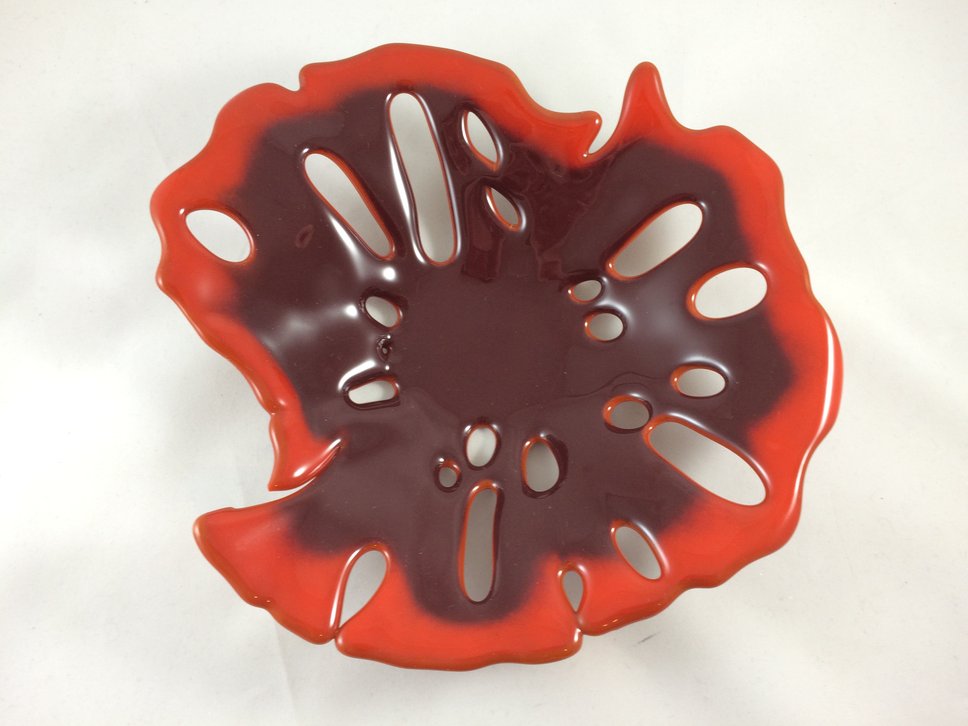 Shades of red and burnt orange glass sea flower bowl/sculpture