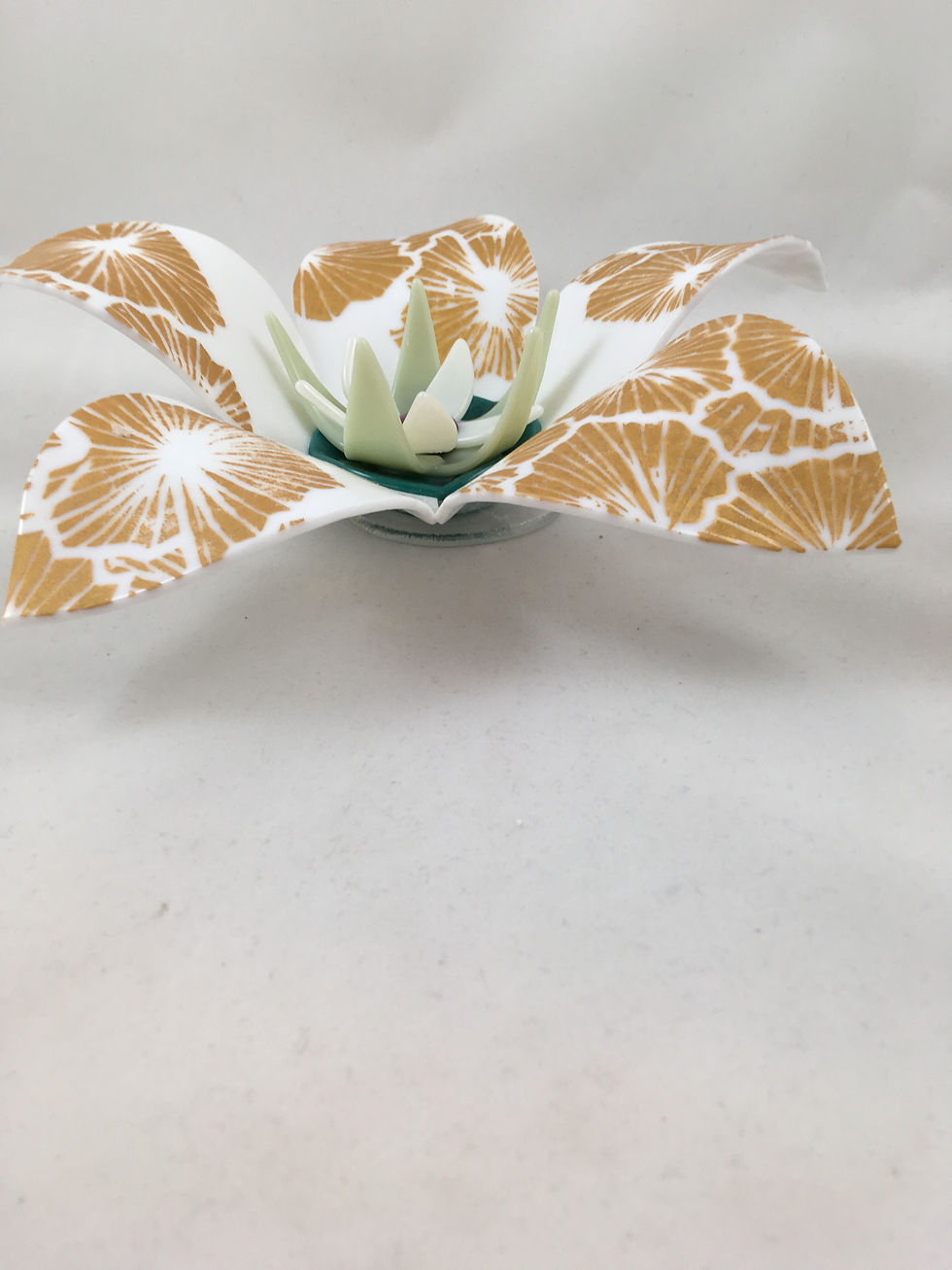 Thumbnail: White glass flower with gold enamel