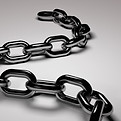 A chain on a solid surface, representing the bondage of platform dependency.