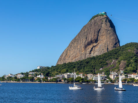 Sailing boats under Sugarloaf mountain during Rio Hidden Gems Tour