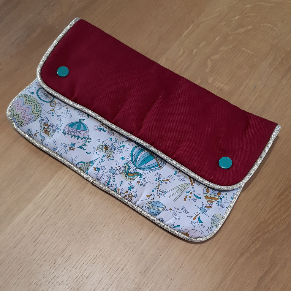 Pochette passepoilée
