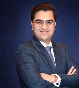 Abhay Bhutada, Managing Director of Poonawalla Fincorp, confidently leading the financial institution with vision and expertise.