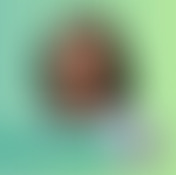 Photo of Fatema Hardwarewala on blue-green background