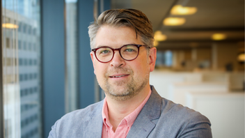 Professional headshot of Matthew Davis