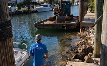 Dredging and underwater debris removal in Boca Raton, FL to clear waterfront areas