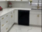 Modern kitchen remodeling with custom cabinets, quartz countertops, and island by Tebystone Construction Group in Miami