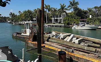 Marine excavation and shoreline preparation for dock construction in Hallandale Beach, FL