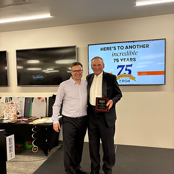 Grant Simmons Recipient of Herb McLaughlin Development award presented by Warren Maskoske.