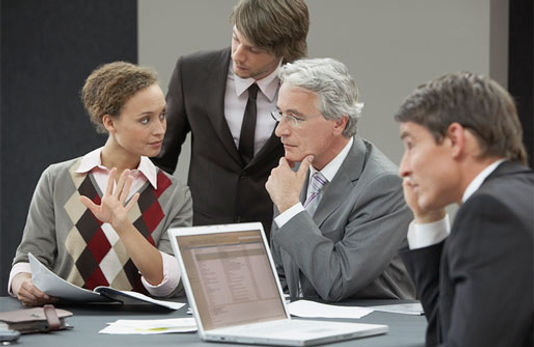 Team of business users making decisions.