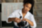 medium-shot-woman-setting-up-camera.jpg