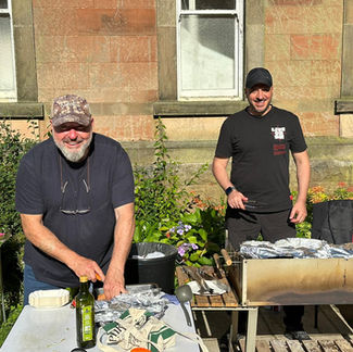 Germen Brethren making Currywurst