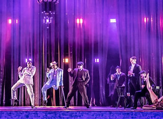  Jeremiah (Prince Lyons), Barney (Musa Motha), John (Joseph Kudra), and cast in Rambert Dance's Peaky Blinders: The Redemption of Thomas Shelby. photo by Johan Persson