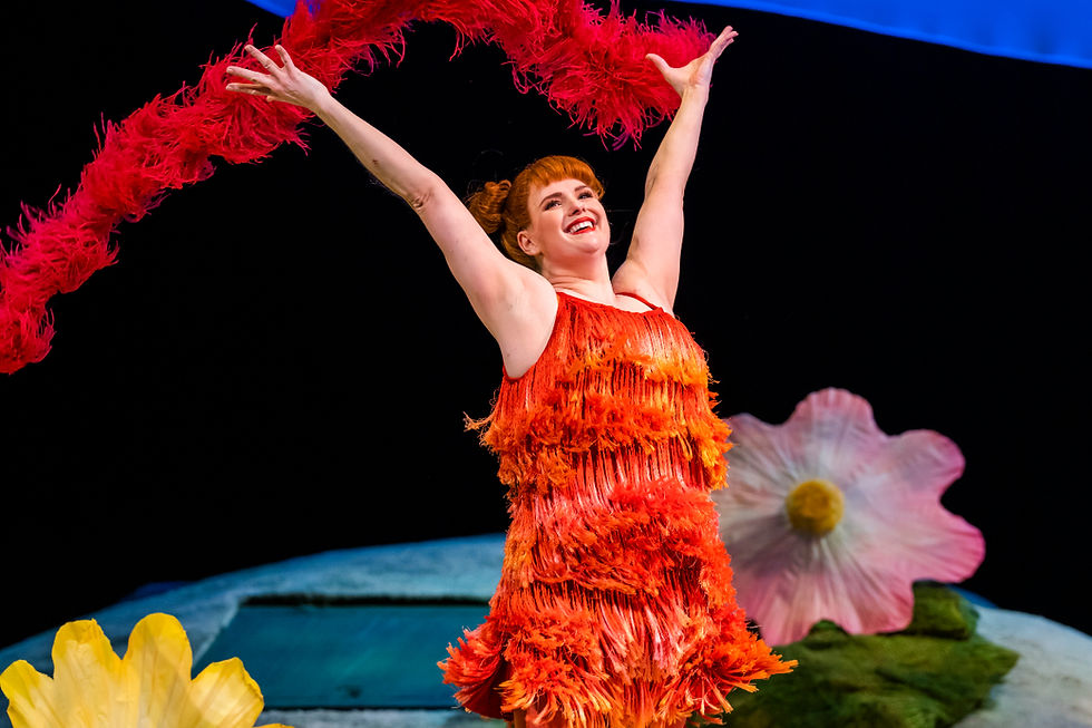 Elin Pritchard as Vixen Sharp-Ears in Opera North's production of The Cunning Little Vixen. cr Tristram Kenton