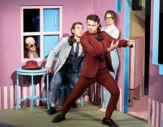Henry Neill as Figaro, Adam Maxey as Dr Bartolo, Benjamin Schilperoort as Don Basilio and Faryl Smith as Berta in Clonter Opera's production of The Barber of Seville. credit Edward Robinson 