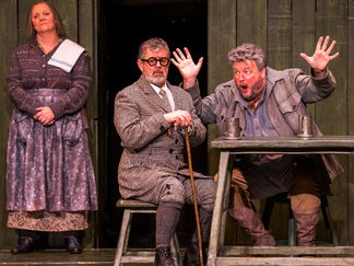 Claire Pascoe as Innkeeper's Wife, Paul Nilon as Schoolmaster and James Rutherford as Forester © Tristram Kenton