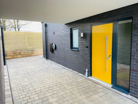 Blue bricks, smooth white render, block paved driveway, yellow front door, norfolk, norwich, earlham road, recreation road, ARC Homes