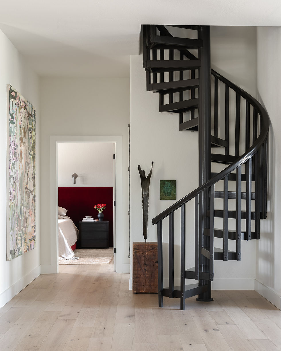 Modern spiral staircase by Ashley Ferguson Interiors