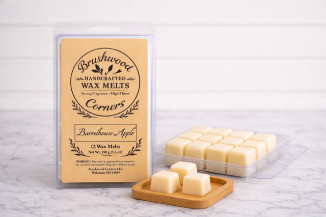 Handcrafted Barrelhouse Apple wax melts by Brushwood Corners in a clear clamshell with kraft label, displayed with wax cubes