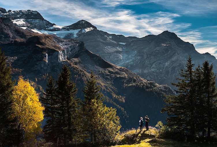 Hikers in Mountainous Landscape