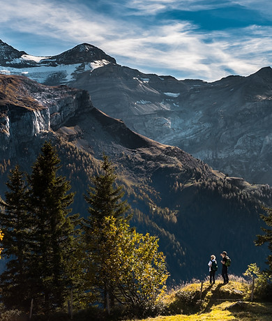 Hikers in Mountainous Landscape