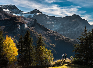 Hikers in Mountainous Landscape