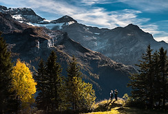 Hikers in Mountainous Landscape