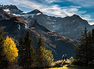Hikers in Mountainous Landscape