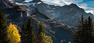 Hikers in Mountainous Landscape