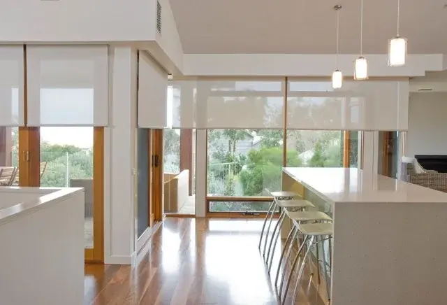 Contemporary sunscreen blinds installed by Blinds in Style, providing UV protection and da