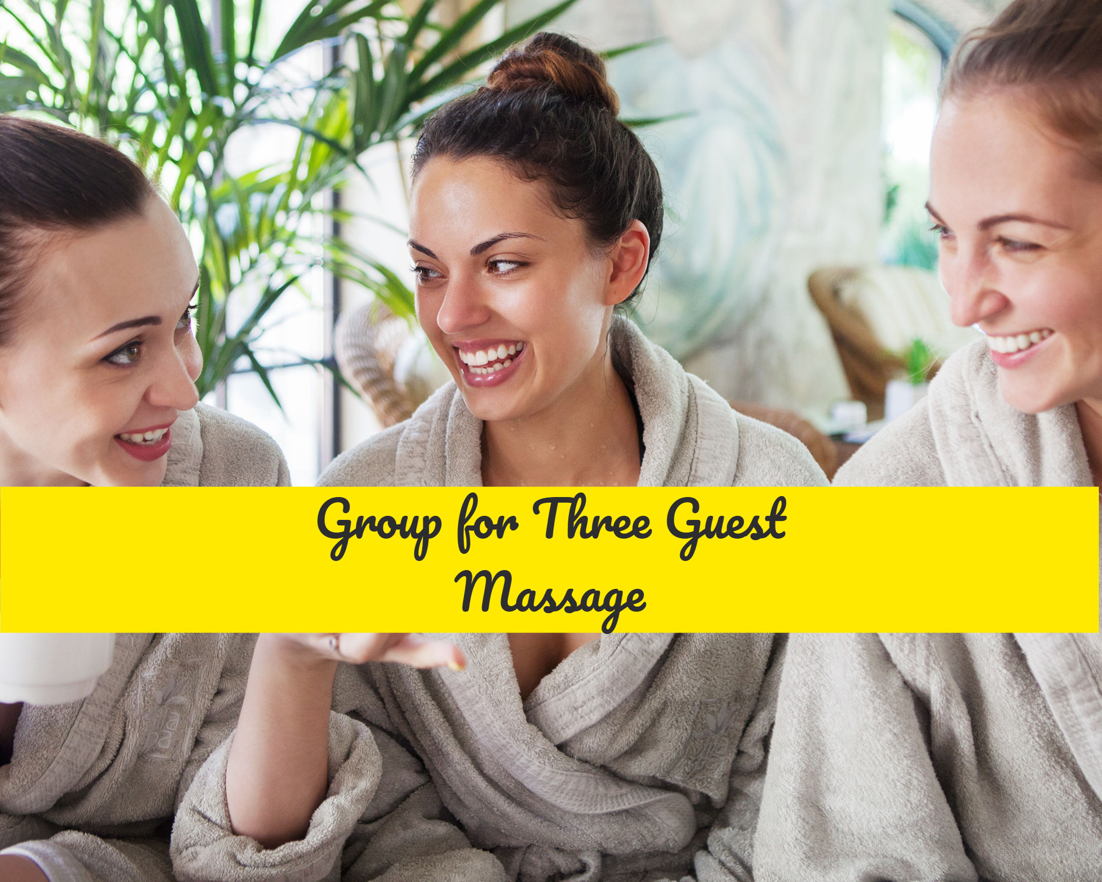 A couple receiving a Royal Escape Massage for Three guests.