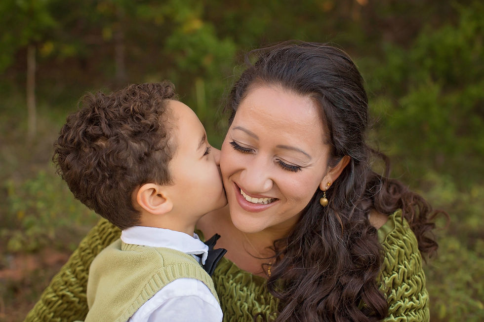 son kissing his mother on the cheek
